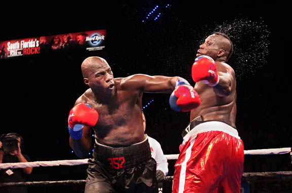 Terrance ‘Big Jim’ Marbra delivers a left hook to Ernest ‘Zeus’ Mazyck Sept. 5 during bout 4 of the eight-card World Heavyweight Champions Fight Night at Hard Rock Live in Hollywood. Marbra won the four rounds by decision.