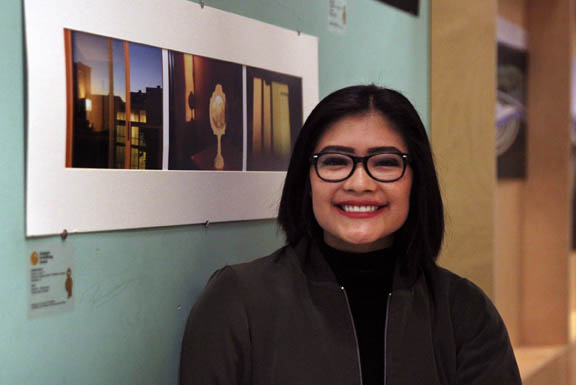 Akira Billie, a junior at American Heritage School in Plantation, poses Feb. 12 at Young At Art Museum with her photographic triptych ‘Cozy,’ which won a Gold Key in the 2016 Scholastic Art & Writing Awards. 
