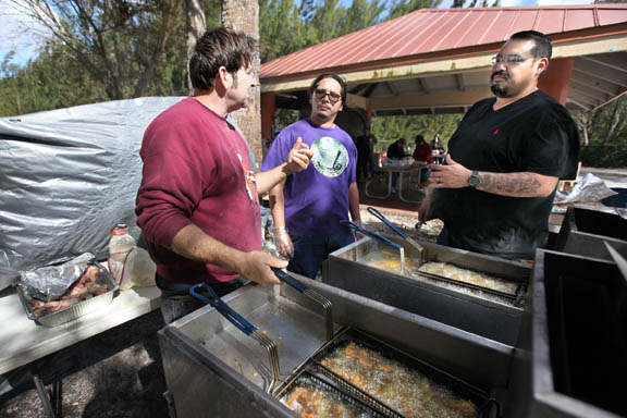 Bruce Duncan, Paul Billie and Lewis Gopher are a fish-frying force Jan. 23 during the 9th annual Hollywood Fish Fry at Markham Park in Sunrise.
