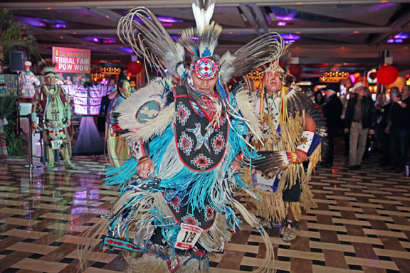 Dancers give an exhibition on the casino floor of the Hollywood Hard Rock Hotel & Casino Hollywood Feb. 5 to garner interest in the Tribal Fair and Pow Wow at Hard Rock Live. 