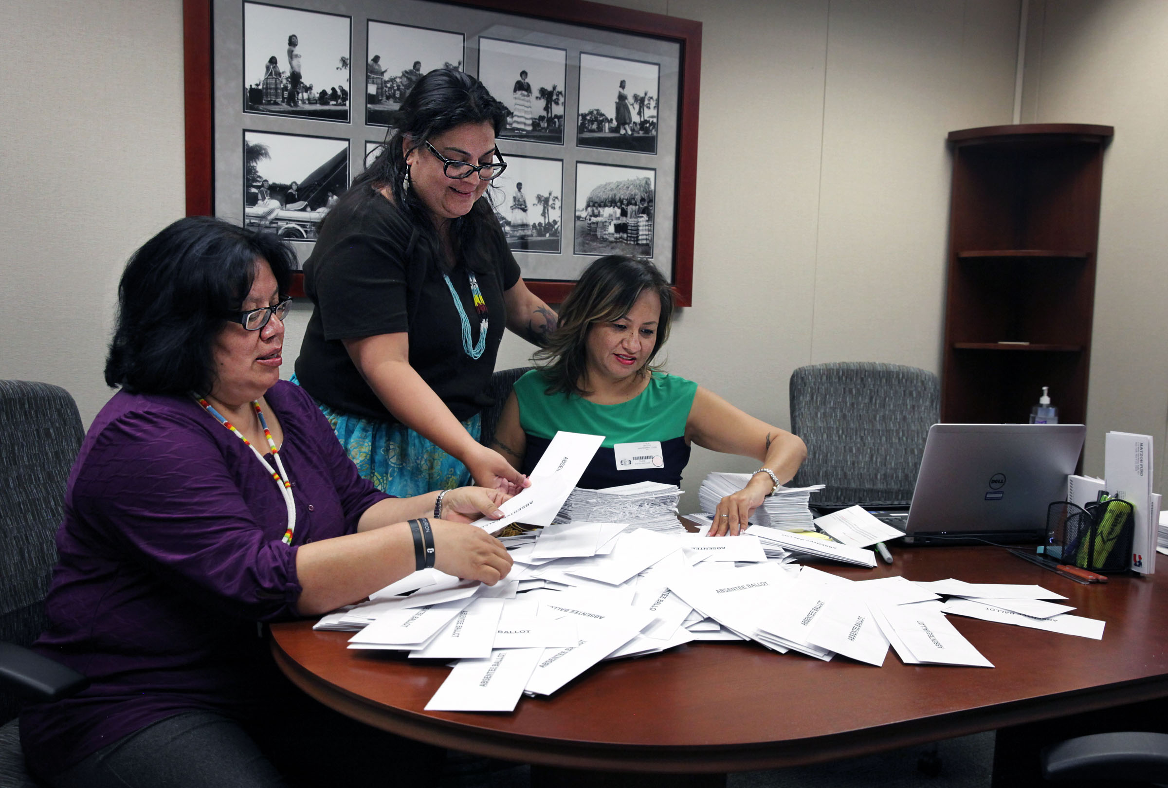 Supervisor of Elections Naomi Wilson, Tribal Secretary LaVonne Rose and Bureau of Indian Affairs government officer Sherry Lovin look over the ballots cast for the election for an additional seat on Tribal Council to represent the Immokalee community.