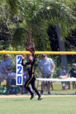American Heritage centerfield Kiauna Martin gets ready to make a catch in the Class 6A state championship game May 7 at Historic Dodgertown in Vero Beach. 