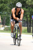 Pete Osceola III focuses during the 112-mile bike portion of the Memorial Hermann North American Championship Ironman Texas on May 14 in The Woodlands, Texas. (Photo by FinisherPix.com)