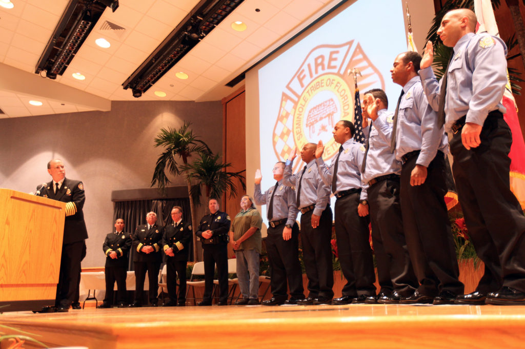 Six new firefighter/paramedics are sworn in by Fire Chief Donald DiPetrillo during a ceremony May 5 at Tribal Headquarters. 