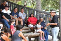 Longest Walk 5 leader Dennis Banks talks about the mission of the walk to Seminole citizens at Billie Swamp Safari June 4. (Beverly Bidney photo)