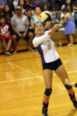 Cheyenne Nunez returns the ball during a volleyball match for Okeechobee High School.