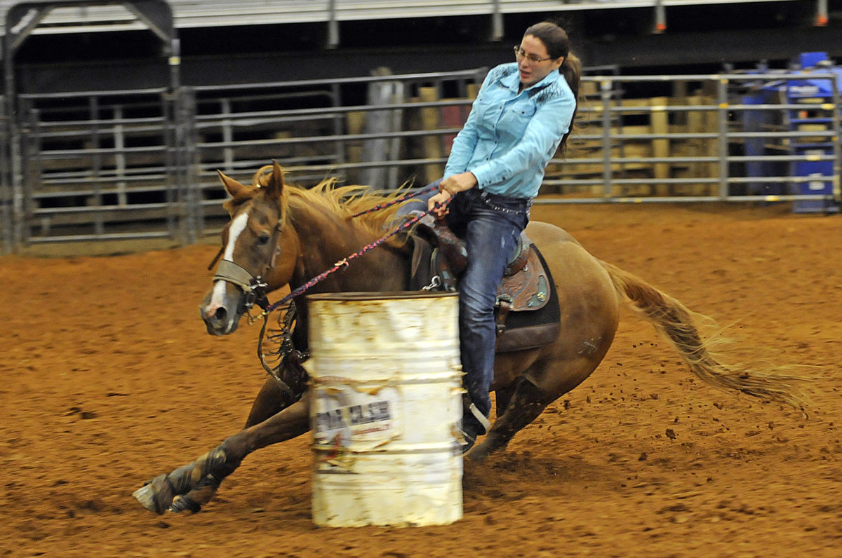 Jacee Jumper, of Brighton, guides her horse around a barrel during junior barrell racing July 2 at Fred Smith Rodeo Arena. Jacee finished in first place. (Keith Lovejoy, Keith Lovejoy Photography)