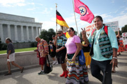 Members of We Do Recover Charlie Tiger, Kenny Tommie, Arnie Gore and Christopher Billie pose for a photo with American Indian Movement founder and leader Dennis Banks of the Longest Walk 5 as they arrive at the Lincoln Memorial in Washington, D.C. on July 15.