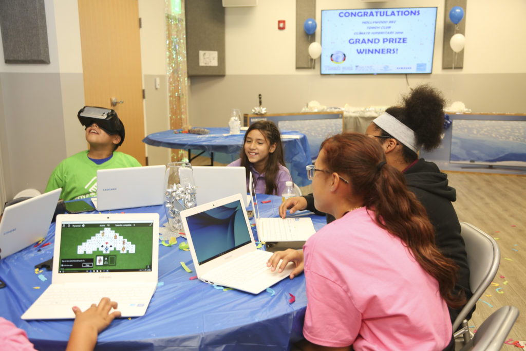 Hollywood Boys & Girls Club’s Franklin Primeaux, Ivory Vasquez, Mae’Anna Osceola-Hart and Genesis Pagan enjoy prizes that came with being grand prize winners in the Climate Superstars Challenge. (Stephanie Rodriguez photo)