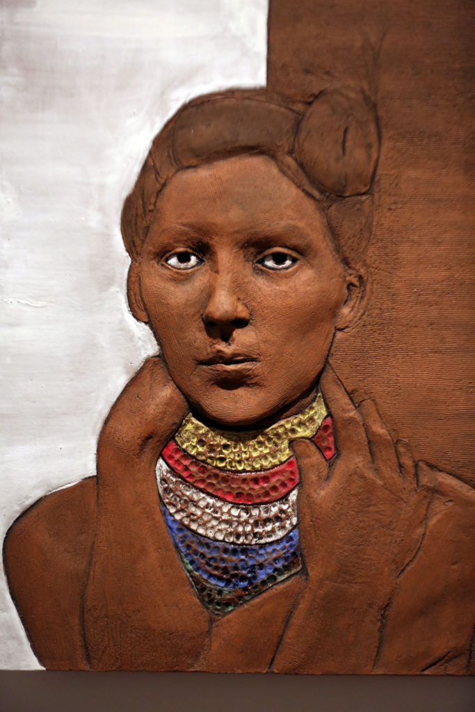 One of Jessica Osceola’s bas-relief ceramic self-portraits on display at FGCU’s ArtLab Gallery.(Beverly Bidney photo)
