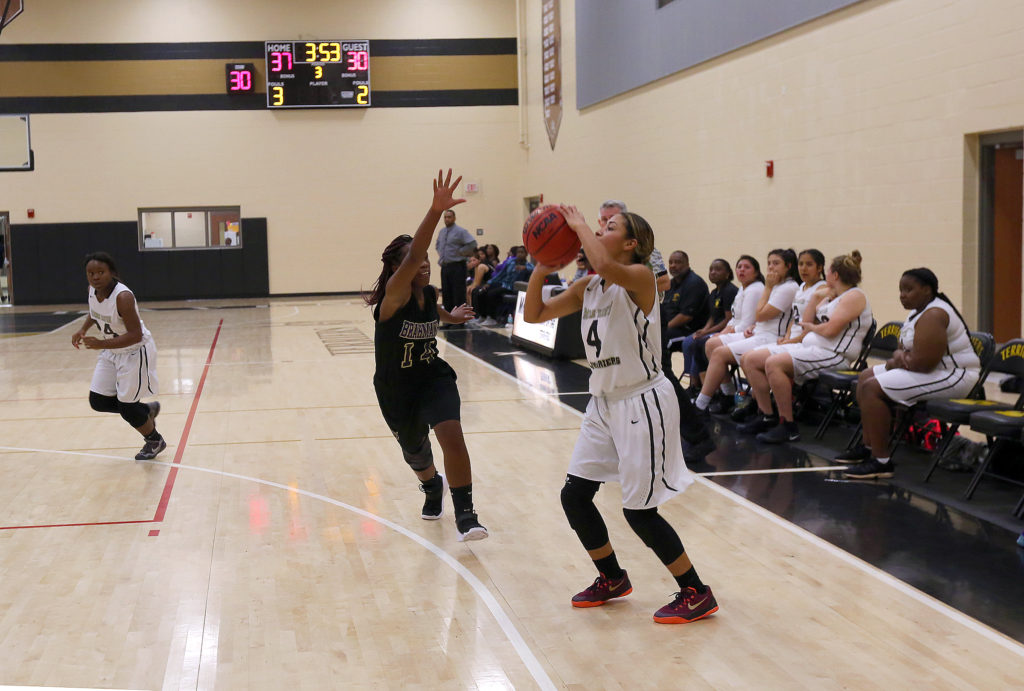 Sydnee Cypress lines up a 3-point shot for Moore Haven. (Kevin Johnson photo)