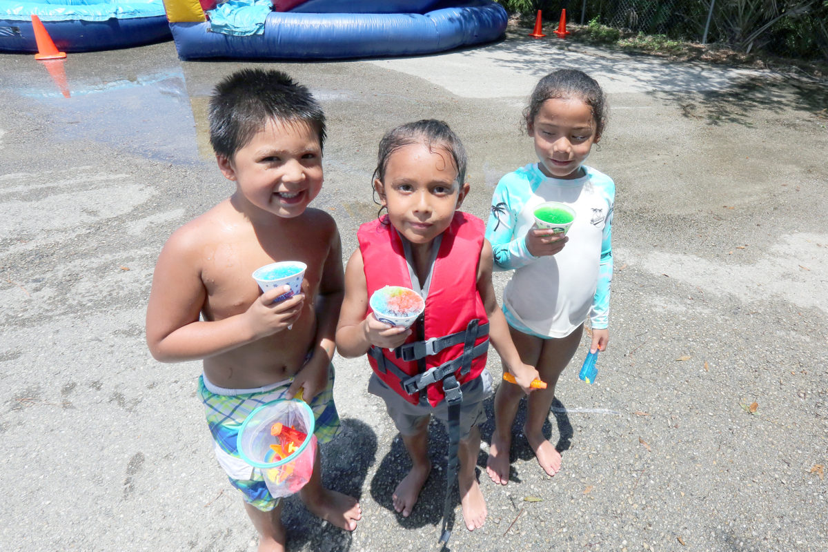 Kids enjoyed refreshments such as these “make your own” snow cones. (Damon Scott photo)