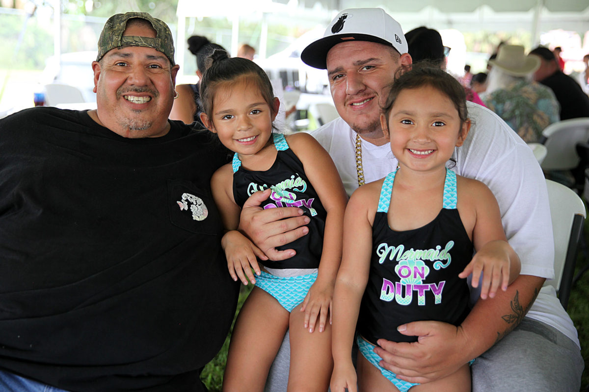 Three generations of the Garza family celebrate Father’s Day in Immokalee. From left are Manual, Mia, Josh and Milani Garza. (Beverly Bidney photo)