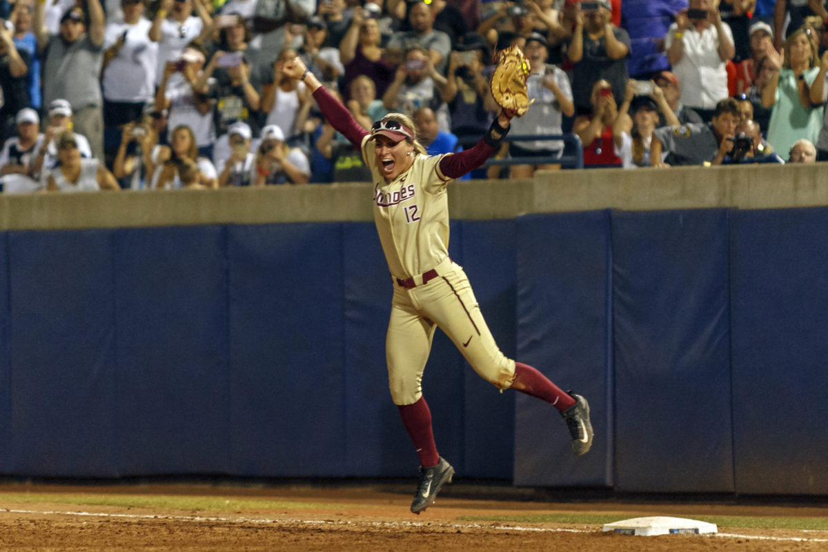 Carsyn Gordon rejoices after making the last out to mark the Seminoles first WCWS win.