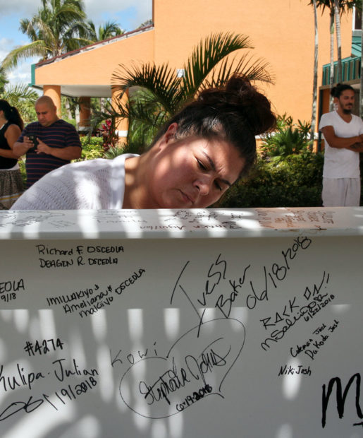 Christina Billie signs the final beam that will be placed in the Seminole Hard Rock Hotel & Casino Hollywood. Members of the Immokalee and Naples communities signed the steel beam in front of the Immokalee field office June 21-25. (Beverly Bidney photo)