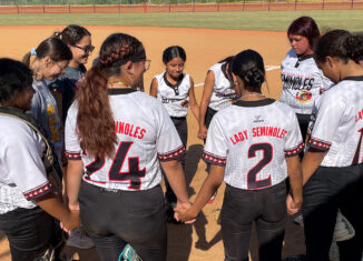 PECS joins hands in a circle.